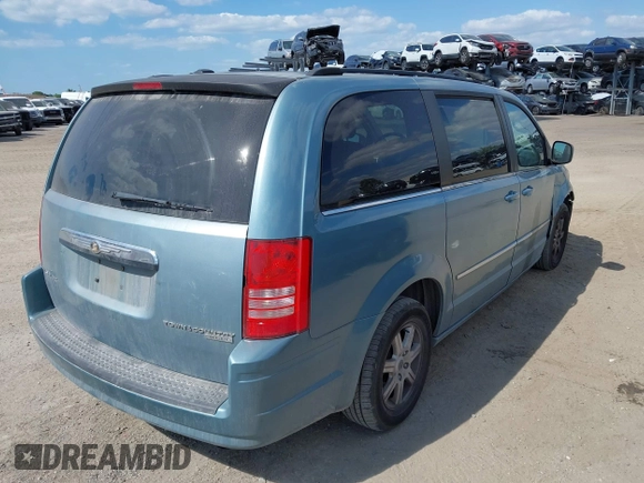2010 Chrysler Town & Country Touring with VIN 2A4RR5D10AR500898, listed as a IAAI auction lot 42079522 with 137,150 mi miles and . Bid and sale history available at DreamBid. Image 4.