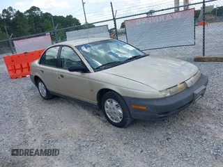1997 Saturn SL z VIN 1G8ZH528XVZ380896, wystawiony jako IAAI lot #42860589 z przebiegiem 336 987 mil mil oraz . Historia ofert i sprzedaży dostępna na DreamBid. Obrazek 1.
