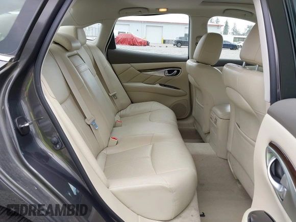 2015 Infiniti Q70 with VIN JN1BY1ARXFM562111, listed as a IAAI auction lot 42473521 with 123,212 mi miles and . Bid and sale history available at DreamBid. Image 8.