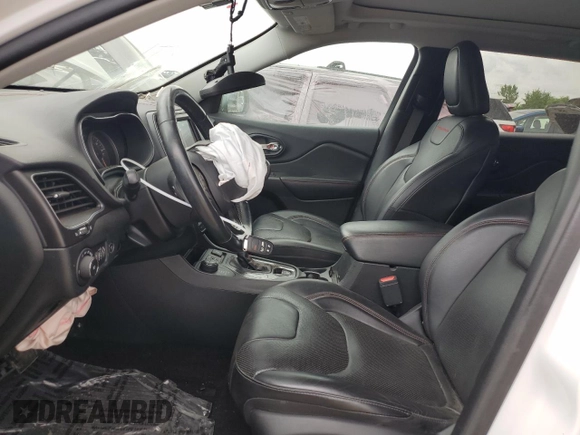 2019 Jeep Cherokee Trailhawk Elite with VIN 1C4PJMBX7KD140720, listed as a Copart auction lot 64268064 with 61,747 mi miles and Salvage Title. Bid and sale history available at carsss.com. Image 7.
