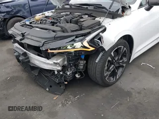 2023 Kia K5 GT-Line z VIN 5XXG64J25PG220733, wystawiony jako IAAI lot #42109640 z przebiegiem 30 917 mil mil oraz . Historia ofert i sprzedaży dostępna na DreamBid. Obrazek 6.