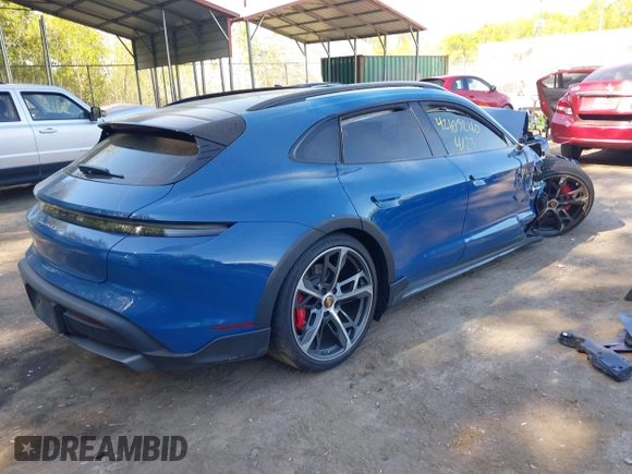 2023 Porsche Taycan 4S z VIN WP0BB2Y19PSA65443, wystawiony jako IAAI lot #42105240 z przebiegiem 265 mil mil oraz . Historia ofert i sprzedaży dostępna na DreamBid. Obrazek 4.