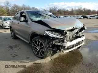 2021 BMW X4 M40i z VIN 5UX2V5C08M9F52562, wystawiony jako Copart lot #83665674 z przebiegiem Nie podano mil oraz Szkoda całkowita • Salvage title. Historia ofert i sprzedaży dostępna na DreamBid. Obrazek 11.