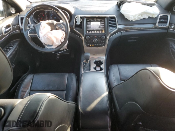 2017 Jeep Grand Cherokee Overland with VIN 1C4RJFCG4HC865483, listed as a Copart auction lot 43138375 with 71,884 mi miles and Salvage Title. Bid and sale history available at carsss.com. Image 8.