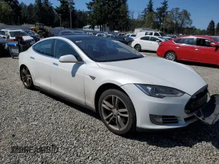 2014 Tesla Model S 60 with VIN 5YJSA1H12EFP51909, listed as a Copart auction lot 55489705 with Not Provided miles and Clean Title. Bid and sale history available at DreamBid. Image 4.