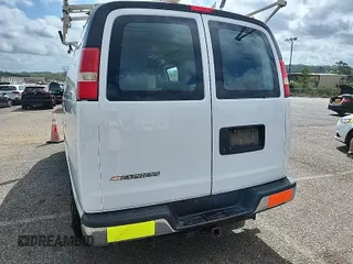 2014 Chevrolet Express Cargo Van with VIN 1GCWGFCA9E1158903, listed as a IAAI auction lot 42088028 with 195,230 mi miles. Bid and sale history available at carsss.com. Image 1.