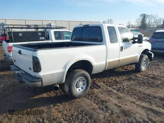 2001 Ford Super Duty F-250 XL with VIN 1FTNX21F91EA15553, listed as a IAAI auction lot 41759332 with 234,023 mi miles. Bid and sale history available at carsss.com. Image 4.