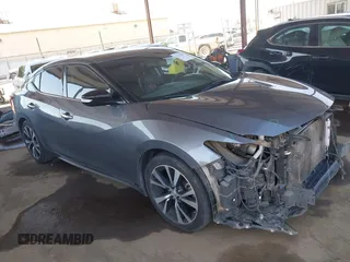 2018 Nissan Maxima SL z VIN 1N4AA6AP7JC398359, wystawiony jako IAAI lot #42237007 z przebiegiem 70 010 mil mil oraz . Historia ofert i sprzedaży dostępna na DreamBid. Obrazek 1.