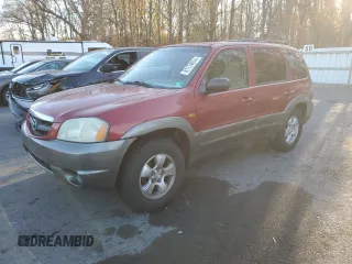 2001 Mazda Tribute LX with VIN 4F2CU08111KM19933, listed as a Copart auction lot 81174614 with 209,736 mi miles and Salvage Title. Bid and sale history available at carsss.com. Image 1.
