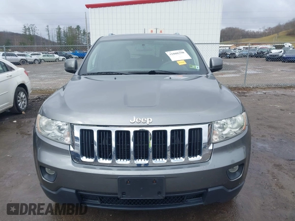 2012 Jeep Grand Cherokee Laredo with VIN 1C4RJFAGXCC118823, listed as a IAAI auction lot 41808398 with 153,509 mi miles. Bid and sale history available at carsss.com. Image 12.