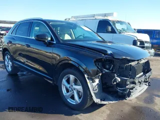 2019 Audi Q3 Premium Plus z VIN WA1BECF35K1070016, wystawiony jako IAAI lot #41279920 z przebiegiem 69 952 mil mil oraz . Historia ofert i sprzedaży dostępna na DreamBid. Obrazek 1.