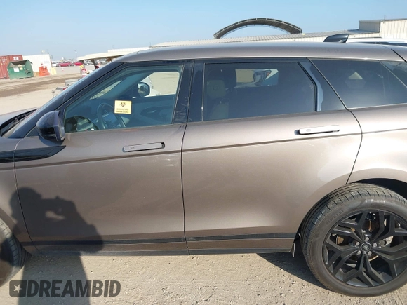 2020 Land Rover Range Rover Evoque S with VIN SALZJ2FX0LH073534, listed as a IAAI auction lot 41871038 with 91,995 mi miles and . Bid and sale history available at DreamBid. Image 14.