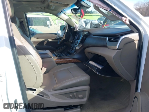 2017 Chevrolet Suburban Premier z VIN 1GNSKJKC9HR117378, wystawiony jako IAAI lot #41610682 z przebiegiem Nie podano mil oraz . Historia ofert i sprzedaży dostępna na DreamBid. Obrazek 5.