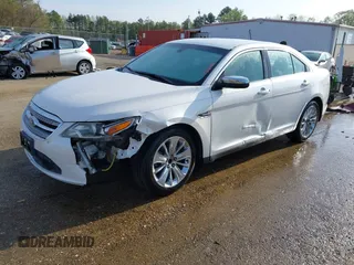 2012 Ford Taurus Limited z VIN 1FAHP2FW1CG103595, wystawiony jako IAAI lot #41913906 z przebiegiem 308 496 mil mil oraz . Historia ofert i sprzedaży dostępna na DreamBid. Obrazek 17.