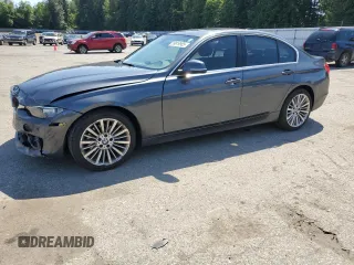 2015 BMW 3 Series 328i xDrive with VIN WBA3B3C5XFJ985147, listed as a Copart auction lot 59819905 with 113,492 mi miles and Salvage title. Bid and sale history available at DreamBid. Image 1.