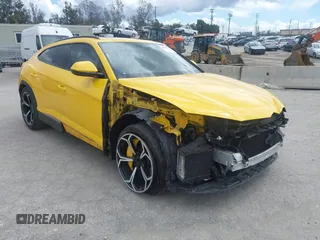 2019 Lamborghini Urus z VIN ZPBUA1ZL7KLA01416, wystawiony jako IAAI lot #41680325 z przebiegiem 72 817 mil mil oraz . Historia ofert i sprzedaży dostępna na DreamBid. Obrazek 1.