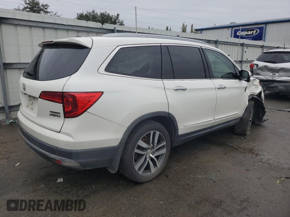 2017 Honda Pilot Touring with VIN 5FNYF6H99HB025600, listed as a Copart auction lot 88131475 with 131,939 mi miles and Salvage Title. Bid and sale history available at DreamBid. Image 3.