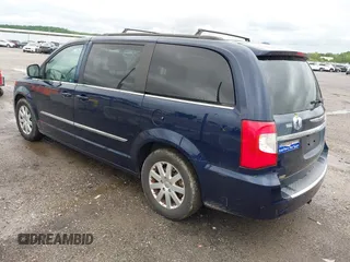 2015 Chrysler Town & Country Touring with VIN 2C4RC1BG3FR716002, listed as a IAAI auction lot 42139802 with 182,830 mi miles and . Bid and sale history available at DreamBid. Image 3.