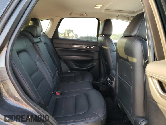 2017 Mazda CX-5 Grand Touring with VIN JM3KFBDL1H0148961, listed as a Copart auction lot 52648115 with 171,767 mi miles and Salvage Title. Bid and sale history available at carsss.com. Image 11.