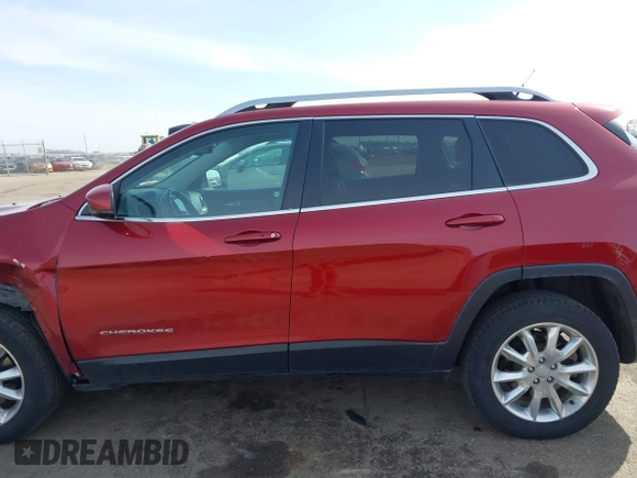 2015 Jeep Cherokee Limited with VIN 1C4PJMDSXFW577462, listed as a IAAI auction lot 41788083 with 155,120 mi miles and . Bid and sale history available at DreamBid. Image 15.
