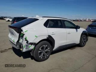 2024 Toyota bZ4X XLE with VIN JTMABACA8RA073861, listed as a Copart auction lot 50030475 with 6,465 mi miles and Salvage Title. Bid and sale history available at DreamBid. Image 3.