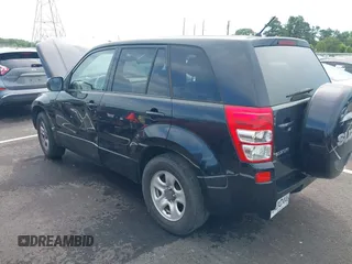 2011 Suzuki Grand Vitara Premium z VIN JS3TE0D22B4100074, wystawiony jako IAAI lot #42532421 z przebiegiem 170 451 mil mil oraz . Historia ofert i sprzedaży dostępna na DreamBid. Obrazek 3.