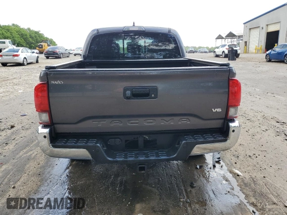 2018 Toyota Tacoma SR5 с VIN 5TFAZ5CN3JX071474, выставлен на аукционе Copart как лот 54677335 с пробегом 86 866 миль миль и Списание • Salvage title. История ставок и продаж доступна на DreamBid. Изображение 6.
