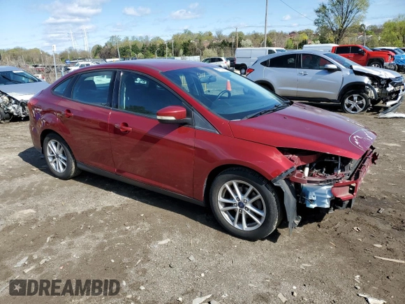 2016 Ford Focus SE with VIN 1FADP3F23GL232985, listed as a Copart auction lot 51309085 with 112,420 mi miles and Salvage title. Bid and sale history available at DreamBid. Image 4.