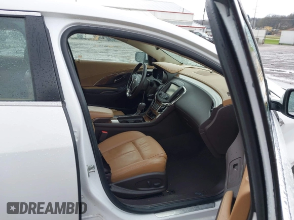 2014 Buick LaCrosse Premium II with VIN 1G4GF5G39EF305460, listed as a IAAI auction lot 41951229 with 127,188 mi miles and . Bid and sale history available at DreamBid. Image 5.