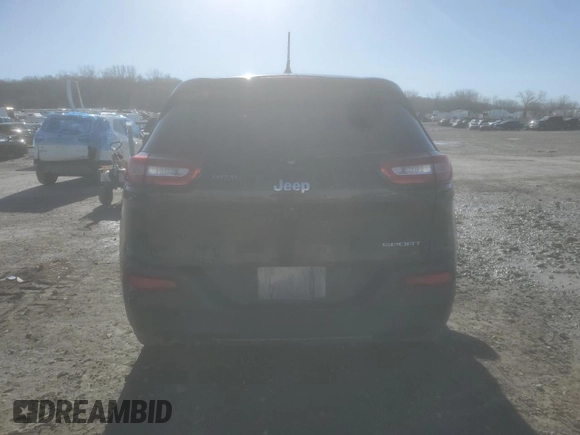 2014 Jeep Cherokee Sport with VIN 1C4PJLAB7EW279562, listed as a Copart auction lot 85054634 with 134,516 mi miles and Salvage Title. Bid and sale history available at DreamBid. Image 6.