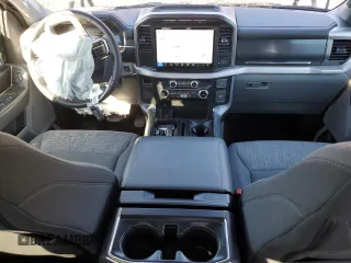 2023 Ford F-150 Lightning Pro with VIN 1FTVW1EL3PWG61686, listed as a Copart auction lot 49578085 with 8,116 mi miles and Salvage Title. Bid and sale history available at DreamBid. Image 8.