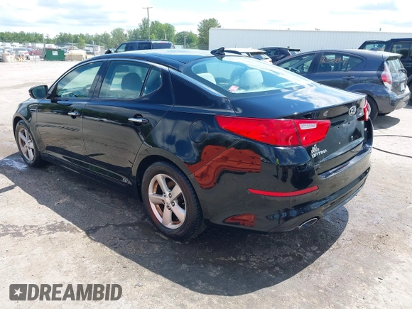 2015 Kia Optima LX with VIN 5XXGM4A71FG387980, listed as a IAAI auction lot 42330602 with 96,189 mi miles and . Bid and sale history available at DreamBid. Image 3.