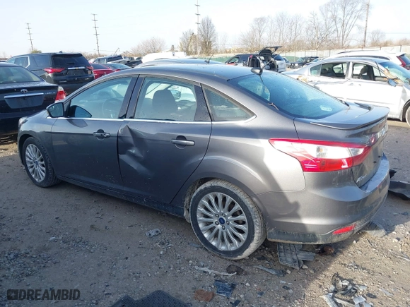 2012 Ford Focus Titanium with VIN 1FAHP3J2XCL421412, listed as a IAAI auction lot 41721565 with 117,632 mi miles. Bid and sale history available at carsss.com. Image 14.