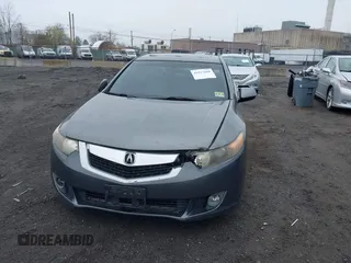 2009 Acura TSX z VIN JH4CU26609C018839, wystawiony jako IAAI lot #41927660 z przebiegiem 187 026 mil mil oraz . Historia ofert i sprzedaży dostępna na DreamBid. Obrazek 6.