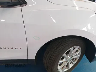 2021 Chevrolet Equinox LT with VIN 3GNAXTEVXMS111392, listed as a IAAI auction lot 42821251 with 63,868 mi miles and . Bid and sale history available at DreamBid. Image 26.