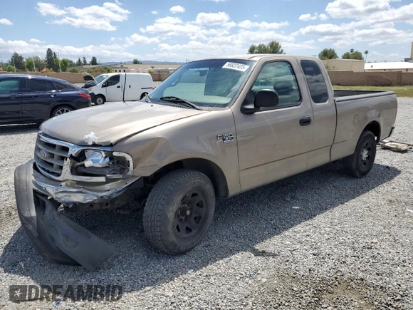 2001 Ford F-150 with VIN 1FTPX17L21NA37619, listed as a Copart auction lot 56922485 with 212,148 mi miles and Salvage title. Bid and sale history available at DreamBid. Image 1.