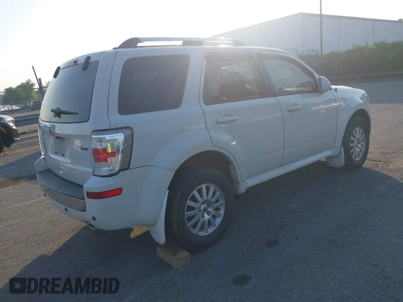 2011 Mercury Mariner Premier with VIN 4M2CN8HG0BKJ02401, listed as a IAAI auction lot 42579483 with 126,276 mi miles and . Bid and sale history available at DreamBid. Image 4.