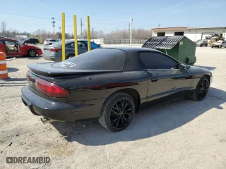 1997 Pontiac Firebird with VIN 2G2FS22K8V2212704, listed as a Copart auction lot 48853145 with 130,474 mi miles and Salvage Title. Bid and sale history available at carsss.com. Image 3.