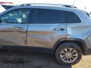 2019 Jeep Cherokee Latitude with VIN 1C4PJMCB8KD167282, listed as a IAAI auction lot 41154149 with 142,664 mi miles. Bid and sale history available at carsss.com. Image 6.