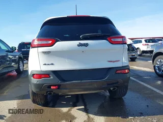 2018 Jeep Cherokee Trailhawk with VIN 1C4PJMBX7JD550173, listed as a IAAI auction lot 41094306 with 74,128 mi miles. Bid and sale history available at carsss.com. Image 16.