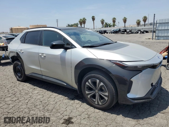 2024 Toyota bZ4X XLE with VIN JTMAAAAA1RA044367, listed as a Copart auction lot 59583075 with 10,890 mi miles and Salvage title. Bid and sale history available at DreamBid. Image 4.