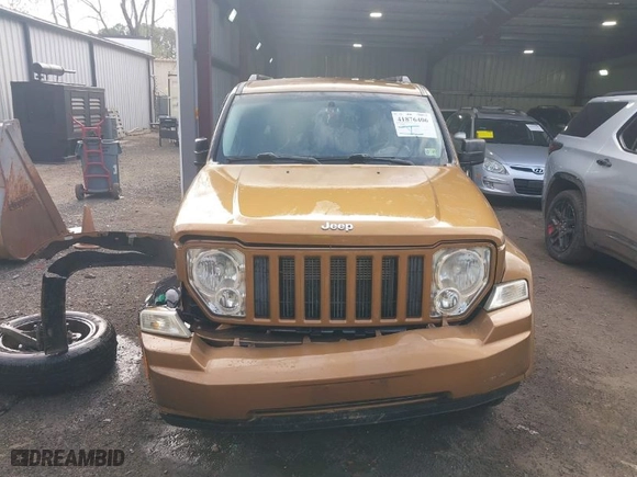 2011 Jeep Liberty Sport with VIN 1J4PN2GK4BW558205, listed as a IAAI auction lot 41876406 with 114,242 mi miles. Bid and sale history available at carsss.com. Image 13.