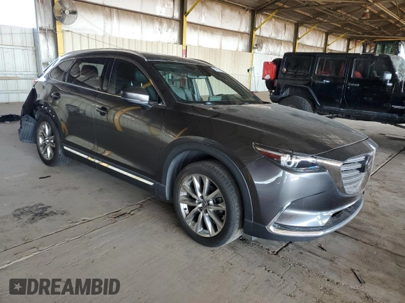 2016 Mazda CX-9 Grand Touring с VIN JM3TCADY3G0119947, выставлен на аукционе Copart как лот 57904515 с пробегом 94 251 миль миль и Списание • Salvage title. История ставок и продаж доступна на DreamBid. Изображение 4.