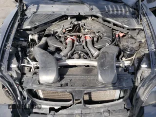 2011 BMW X6 50i with VIN 5UXFG8C52BLZ95196, listed as a Copart auction lot 79100194 with 0 mi miles and Salvage Title. Bid and sale history available at carsss.com. Image 11.