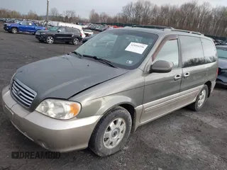 2003 Kia Sedona LX with VIN KNDUP131636378834, listed as a IAAI auction lot 42016556 with 88,751 mi miles and . Bid and sale history available at DreamBid. Image 2.