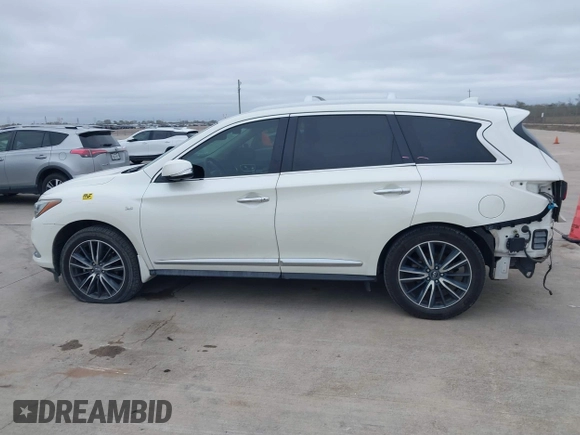 2019 Infiniti QX60 LUXE with VIN 5N1DL0MN2KC551218, listed as a IAAI auction lot 41101804 with 111,621 mi miles. Bid and sale history available at carsss.com. Image 14.