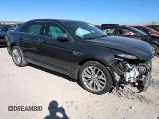 2015 Ford Taurus Limited with VIN 1FAHP2F85FG177916, listed as a Copart auction lot 49004365 with 129,486 mi miles and Salvage Title. Bid and sale history available at DreamBid. Image 4.