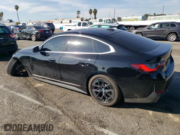 2023 BMW i4 eDrive35 with VIN WBY43AW08PFR28814, listed as a Copart auction lot 42641234 with 13,818 mi miles. Bid and sale history available at carsss.com. Image 2.