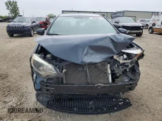 2016 Toyota Corolla L z VIN 5YFBURHE1GP547232, wystawiony jako Copart lot #56063015 z przebiegiem 166 676 mil mil oraz Szkoda całkowita • Salvage title. Historia ofert i sprzedaży dostępna na DreamBid. Obrazek 5.