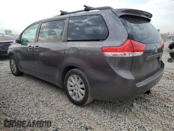 2012 Toyota Sienna XLE with VIN 5TDDK3DC7CS039221, listed as a Copart auction lot 64188804 with 180,811 mi miles and Salvage Title. Bid and sale history available at carsss.com. Image 2.